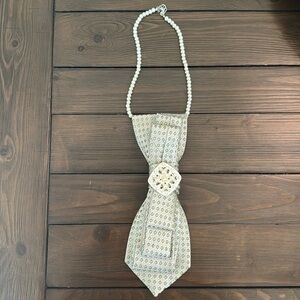 Handmade Upcycled Necktie Bib Necklace with Brooch
Unique & Handmade!